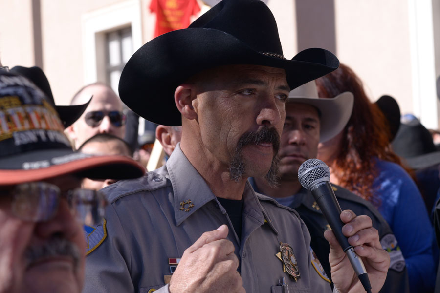 Cibola County Sheriff Tony Mace addresses hundreds of Second Amendment supporters during a pro-gun rally outside the New Mexico state Capital in Santa Fe. Santa Fe, New Mexico on January 31, 2020. File photo: Chuck Jines, Shutterstock.com, licensed.