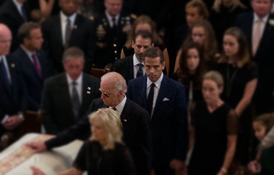 Hunter Biden (center) with his father Vice President Joe Biden and his mother Dr. Jill Biden as they touch his brother Beau Biden's casket following the procession during the funeral mass at St. Anthony of Padua Roman Catholic in Wilmington, Del. June 6, 2015. Official White House Photo by Pete Souza.