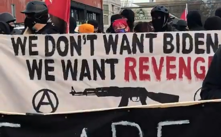 The ANTIFA members – dressed in black and wearing face masks – were protesting Biden’s inauguration and carried a large banner that bore the message: We don’t want Biden. We want revenge for police murders, imperialist wars, and fascist massacres.