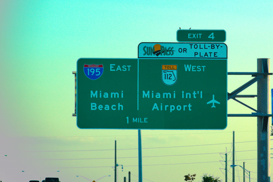 South Florida's Miami Beach landmark and Miami International Airport interstate 195 Highway Exit showing a Sun Pass toll, Miami, Florida