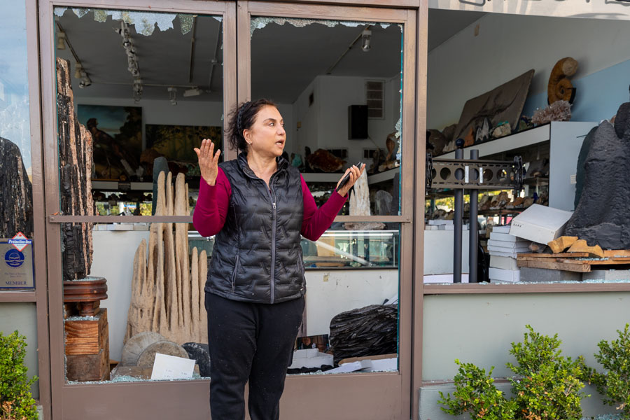 A Santa Monica, California shop owner arrives at her place of business on May 31, 2020 to find that it has been looted. 