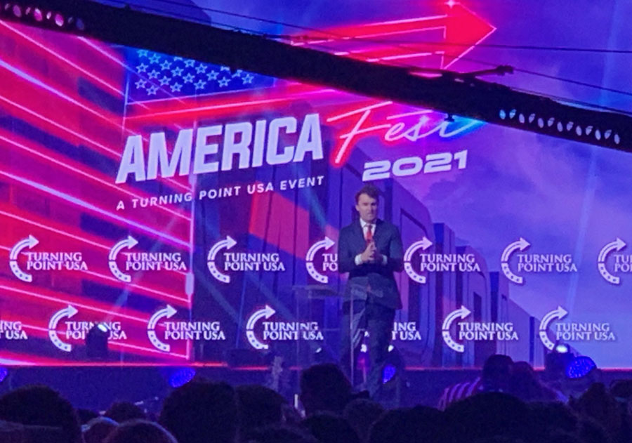 Charlie Kirk of Turning Point USA at America Fest 2021. Photo credit: Marc Ang. 