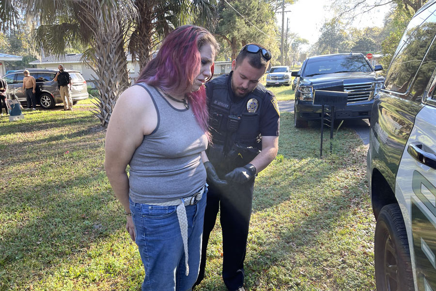 Kendra Marie Long, 28, being taken into custody for capital sexual battery on a child after interviews were conducted by Child Protective Services and detectives.