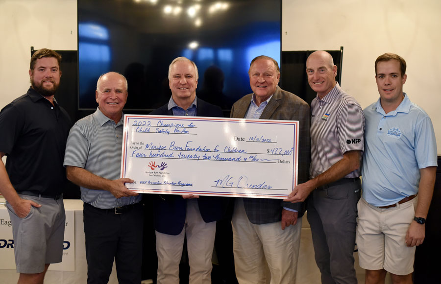 The 2022 Dream Finders Homes MBF Champions for Child Safety Pro Am Golf Tournament, presented by Vallencourt Construction, raised a record $422,000 to support MBF Prevention Education Programs. From left, MBF Board Member Austin Burr, Honorary Chairman Mark McCumber, MBF Founder and Chairman Ed Burr, Tournament Chair M.G. Orender, Honorary Chairman Jim Furyk, and MBF Board Member Garrison Burr.