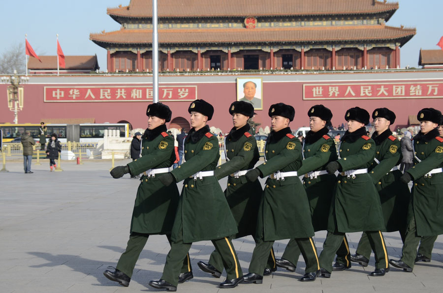 The chinese soldiers on duty time to protect and safe situation in peace for chinese people and any traveler at Tian An Men square, Beijing China