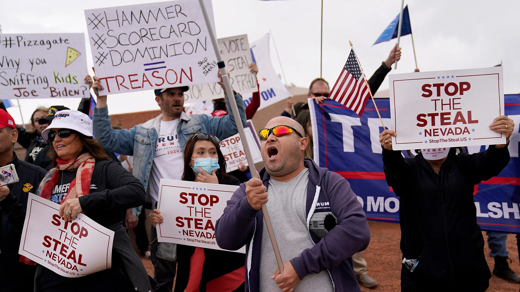 Supporters of President Donald Trump protest outside of the Clark County Elections Department in North Las Vegas, Nev., Saturday, Nov. 7, 2020. (AP Photo / John Locher)
