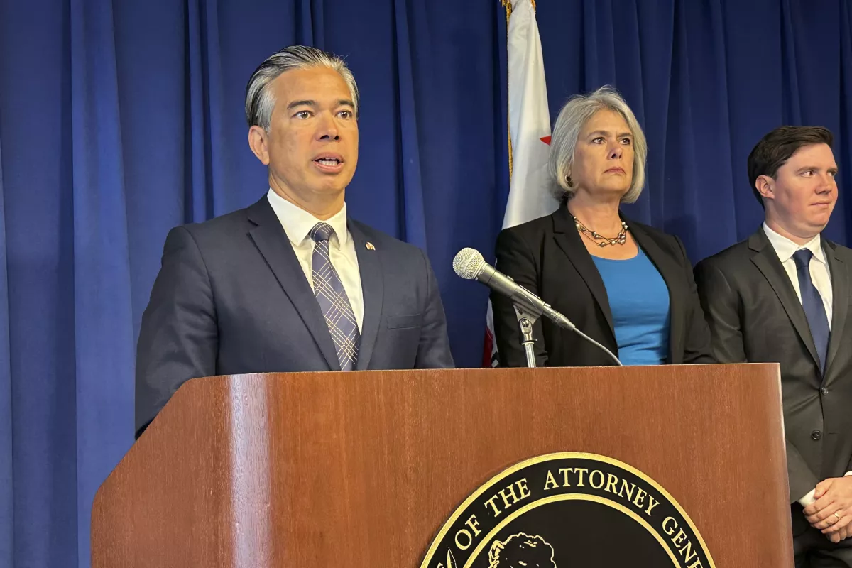 California Attorney General Rob Bonta, left, speaks during a news conference in Sacramento, Calif., on May 1, 2023. Bonta announced Friday, Aug. 4, an investigation into “potential legal violations” in a local school district’s policy that requires teachers to notify parents if their child identifies as transgender or wants to use a name or pronoun different from what’s on their birth certificate. (AP Photo/Adam Beam, File) (Adam Beam / Associated Press)
ASSOCIATED PRESS
