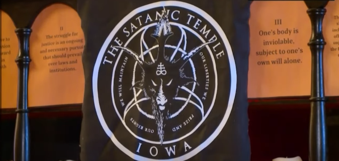 satanic-temple-display-charges-against-former-mississippi-house-candidate-at-iowa-capitol